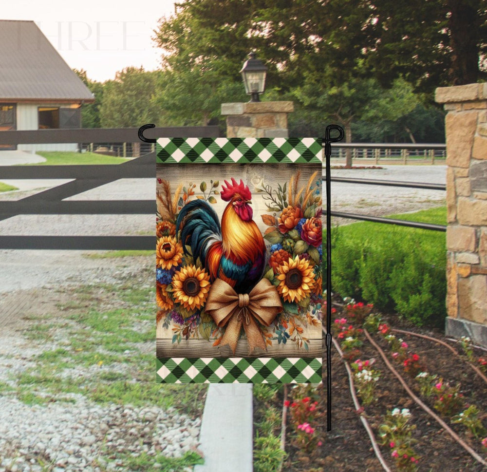 A beautiful rustic Garden Flag featuring a colorful Rooster Sunflowers, florals and a burlap bow.