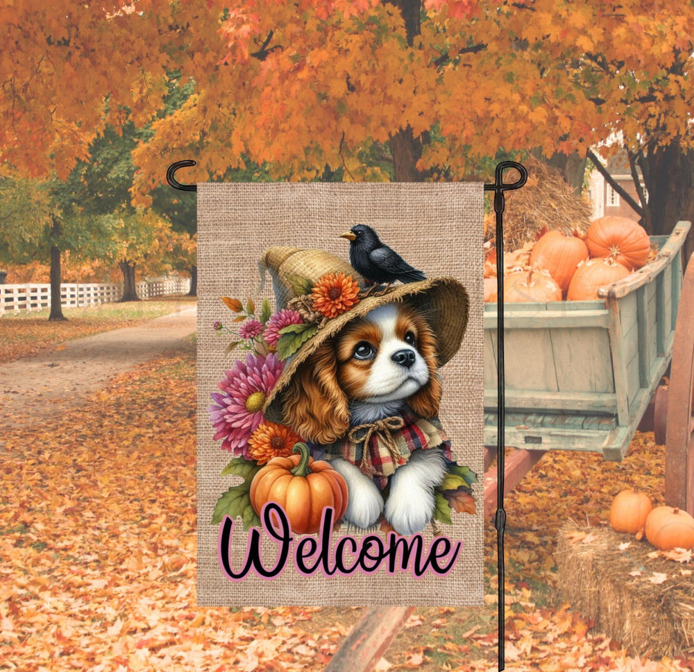 An adorable Cavalier King Charles Spaniel Puppy Dog dressed as a Scarecrow with a Welcome Fall message.