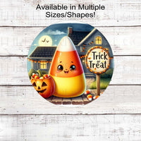 A Trick or Treat sign with an adorable Candy Corn and and Jack O Lantern candy bucket