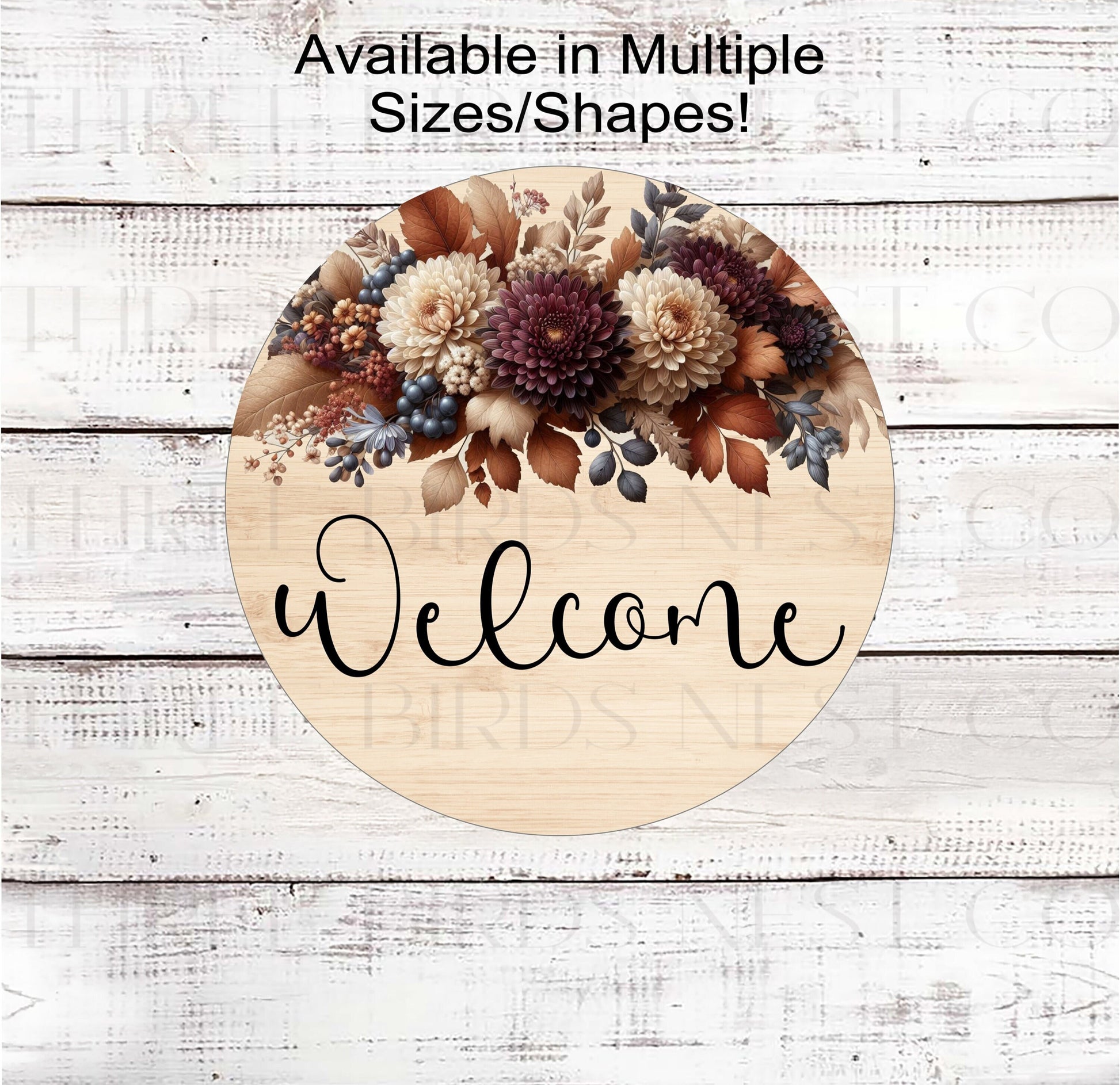 A beautiful Welcome Wreath Sign with Mums and Fall Florals on a rustic wood look background.