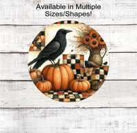 
              An adorable Primitive Wreath Sign featuring a black Crow sitting on a pumpkin, next to a vase of fresh apples with pip berries all around. Fall flowers on a background is a Fall colored quilt.
            