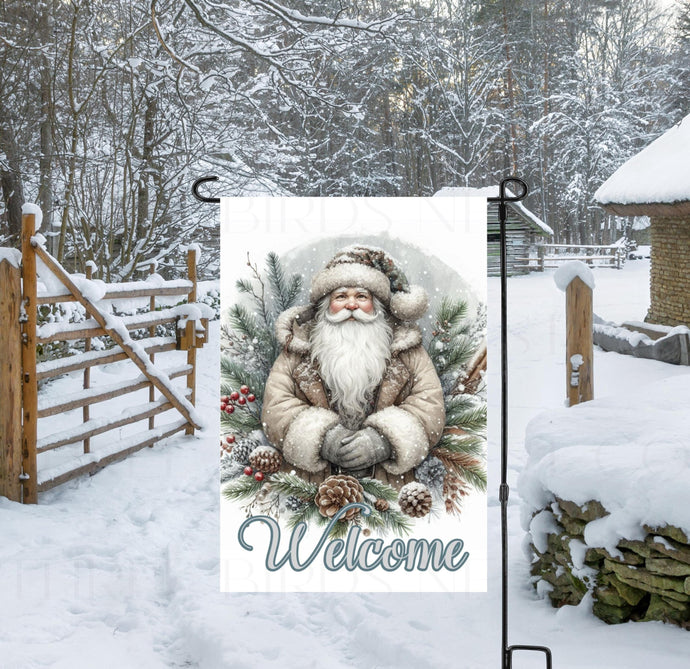 A Woodland Santa Claus Garden Flag that is perfect for your Christmas decor.