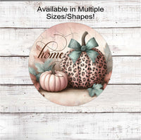 
              An adorable Fall Wreath Sign featuring pink and leopard pumpkins with a Home message.
            