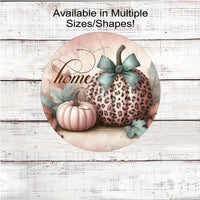 An adorable Fall Wreath Sign featuring pink and leopard pumpkins with a Home message.