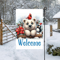 An adorable Polar Bear, Penguin and red Cardinal bird with a Welcome message- this Garden Flag is perfect for your Winter yard decor.