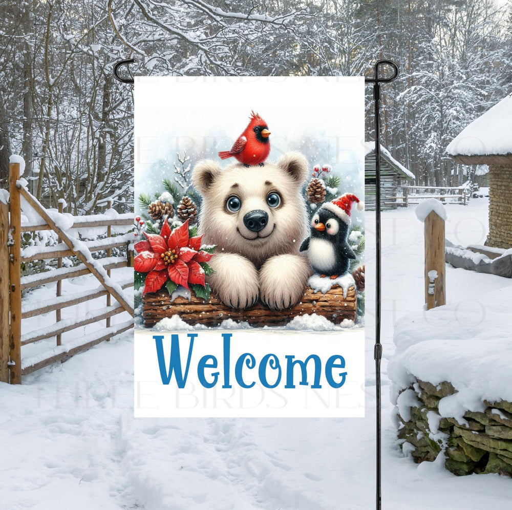 An adorable Polar Bear, Penguin and red Cardinal bird with a Welcome message- this Garden Flag is perfect for your Winter yard decor.