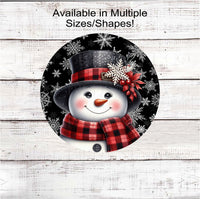 
              An adorable Snowman dressed in a red and black hat and scarf on a snowflake black background.
            