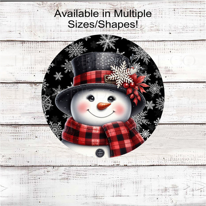 An adorable Snowman dressed in a red and black hat and scarf on a snowflake black background.