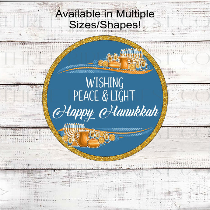 A beautiful Happy Hanukkah sign with gold accents and Menorahs