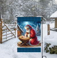 
              A beautiful double-sided Garden Flag featuring a Santa Claus praying over the baby Jesus.
            