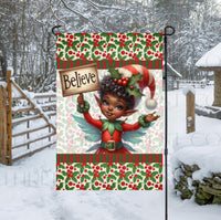 
              A beautiful double-sided Garden Flag featuring an African American Elf holding a sign reminding you to believe in the magic of Christmas!
            