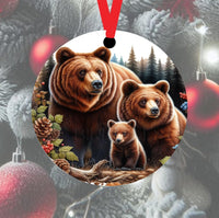 
              An ornament with a family of Grizzly Bears in a Winter setting
            