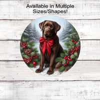 A chocolate Labrador Retriever with in festive Winter setting and a red bow around his neck.