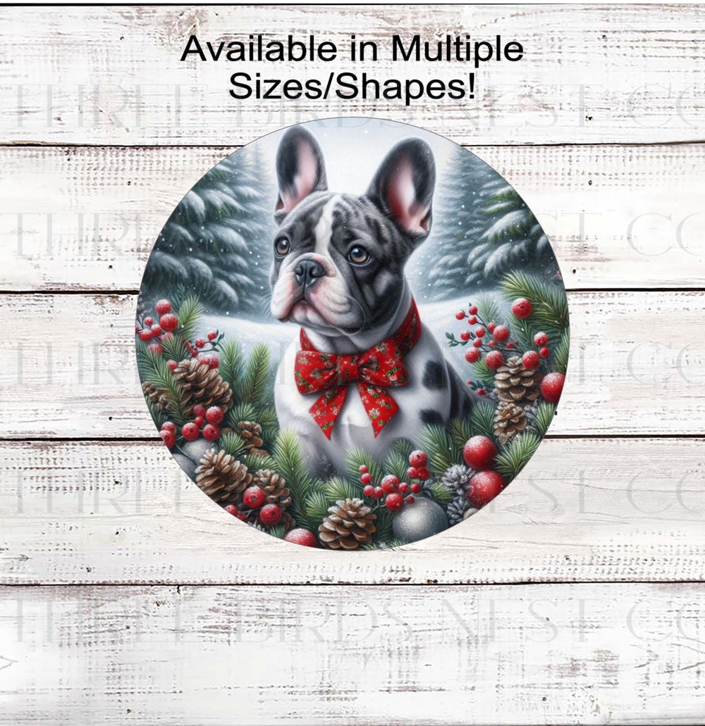 A beautiful merle French Bulldog wearing a red bow in a Winter setting