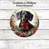 
              A beautiful black and tan Dachshund dog wearing a red bow in a Winter setting
            