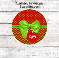 
              An adorable Christmas Wreath Sign that looks like a red and lime green package with a gift tag.
            