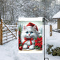 A beautiful fluffy white Cat with Poinsettias in a Winter setting