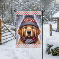 An adorable Golden Retriever dog in a Winter scarf and hat