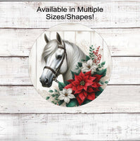 
              A beautiful horse surrounded by white and red poinsettias on a rustic wood background.
            