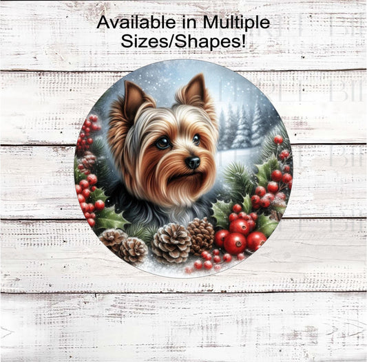 A Yorkshire Terrier dog with in festive Winter setting
