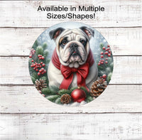 
              A grey, tan and white English Bulldog with in festive Winter setting and a red bow around his neck.
            