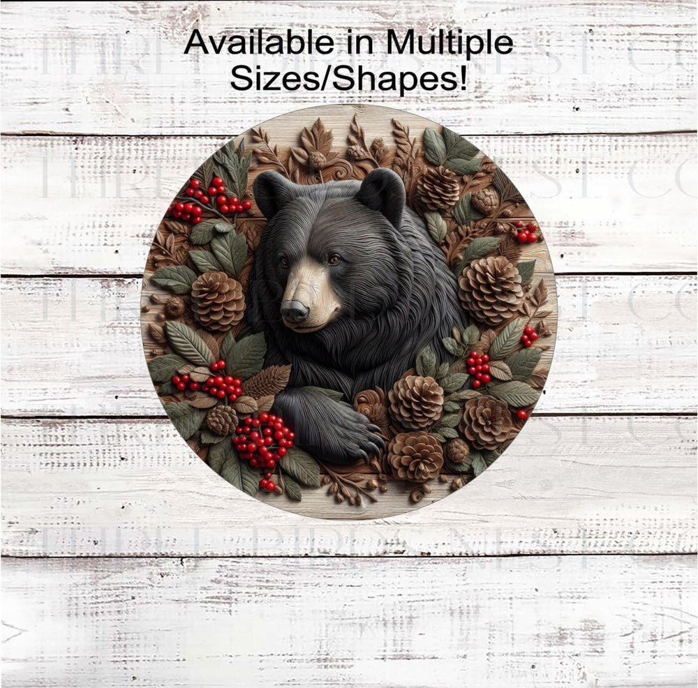 A beautiful black Bear Wreath Sign that features a bull Moose surrounded by a woodland theme