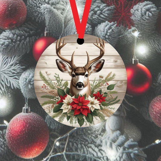 A Mule Deer accented with red and white Poinsettia flowers on a wood look background.