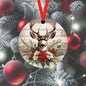 A Mule Deer accented with red and white Poinsettia flowers on a wood look background.