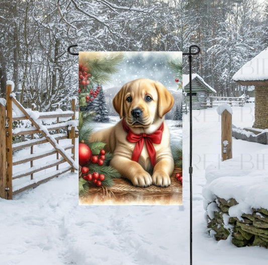 A beautiful yellow Labrador Retriever in a Winter setting wearing a red bow.