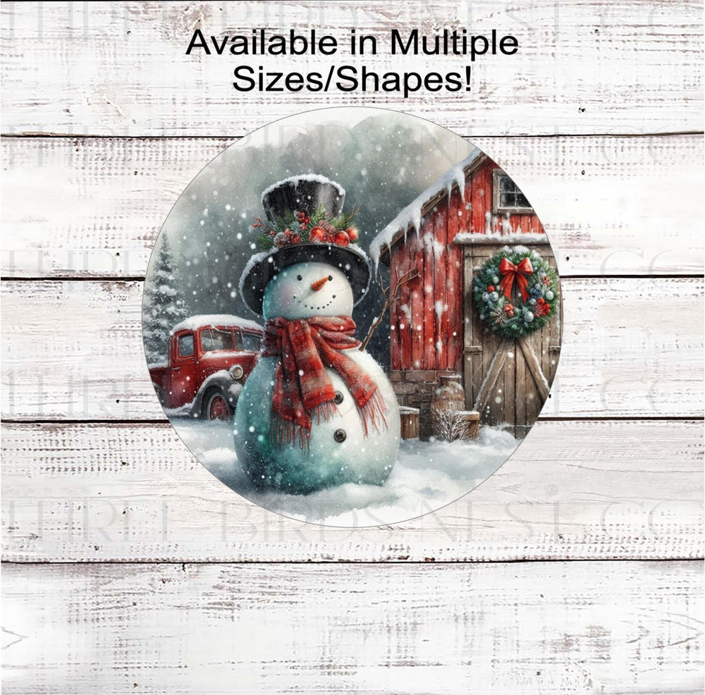 An adorable Snowman in front of a red Barn and old red truck on a snowy farm.