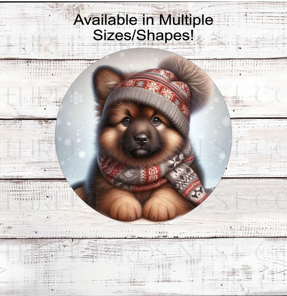 An adorable German Shepherd puppy in a hat and scarf in a Winter setting