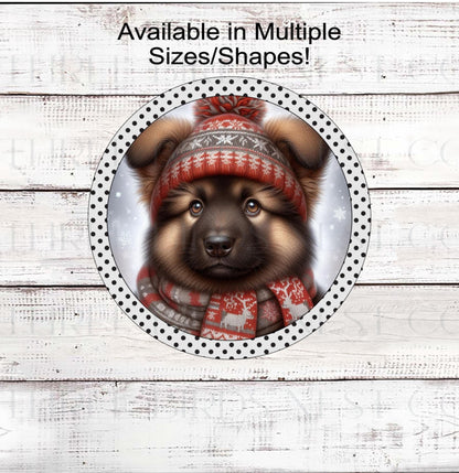 An adorable German Shepherd puppy in a hat and scarf in a Winter setting