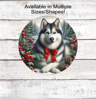 
              A beautiful black Siberian Husky dog wearing a red bow in a Winter setting.
            