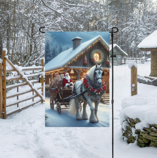 Santa Claus in a carriage pulled by a beautiful Gypsy Vanner Horse in from of a home decorated for Christmas.