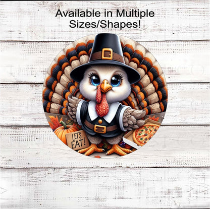 An adorable Pilgrim Turkey ready to celebrate Thanksgiving with a pizza