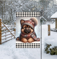 
              An adorable sable German Shepherd in a Winter scarf and hat
            