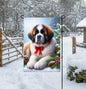 A beautiful Saint Bernard in a Winter setting with a festive bow on.