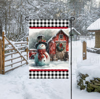 
              An adorable Snowman Garden Flag with a rustic wood barn and an old red truck in the background.
            