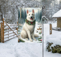 
              A white German Shepherd dog in a Winter Wonderland setting.
            