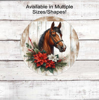 
              A beautiful horse surrounded by white and red poinsettias on a rustic wood background
            