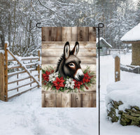 
              An adorable Donkey with a poinsettia swag on a rustic wood background.
            