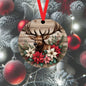 A Elk accented with red and white Poinsettia flowers on a wood look background.