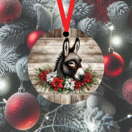 An adorable Donkey accented with red and white Poinsettia flowers
