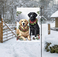 
              A black Labrador Retriever dog and a Golden Retriever dog in a Winter setting with festive collars on.
            