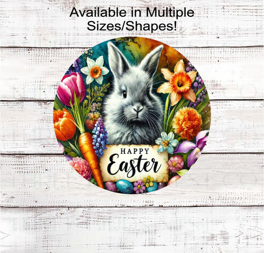 A beautiful grey Easter Bunny surrounded by carrots and Spring Flowers.