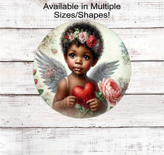 A Valentines Day sign featuring an adorable African American Cupid cherub angel with a red heart