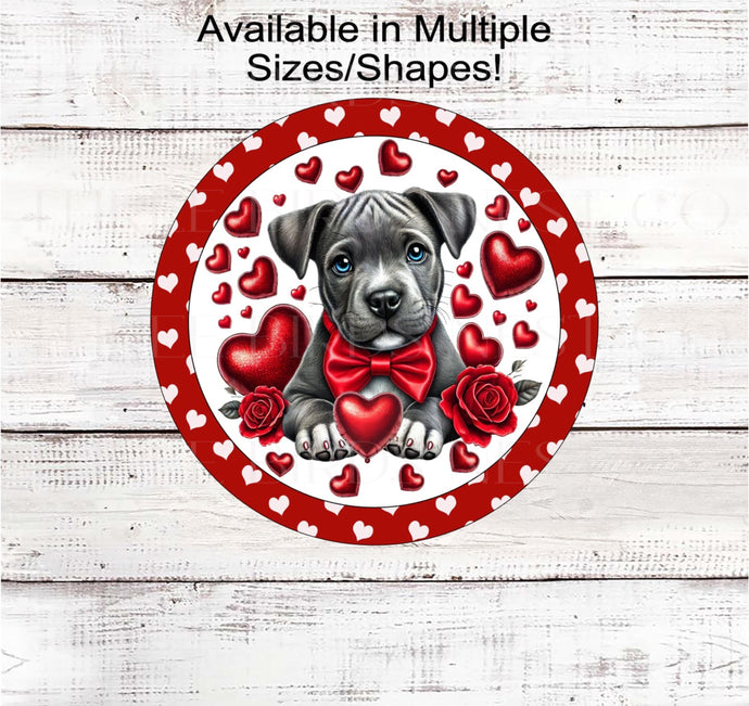 This adorable Pit Bull puppy has red hearts and roses and is ready to be your Valentine!