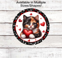 
              This adorable calico Kitten/ Cat has red hearts and is ready to be your Valentine!
            