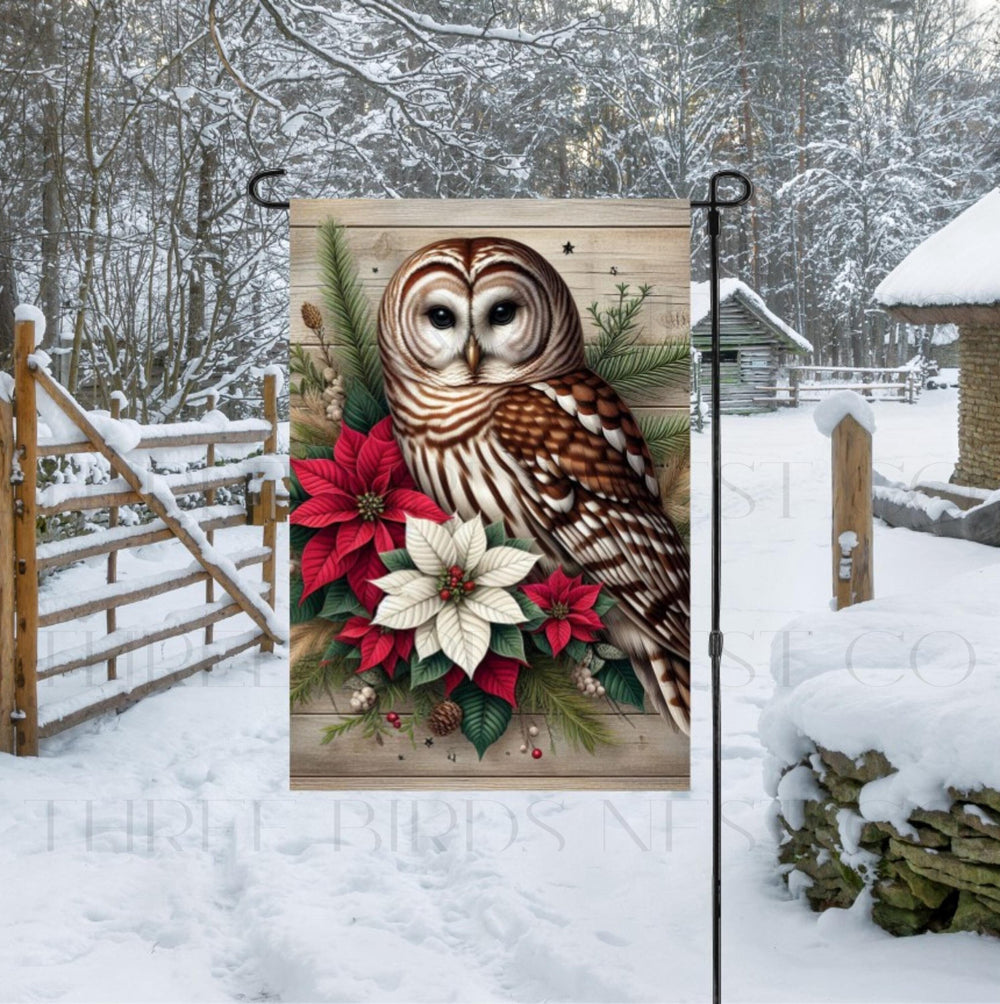 A beautiful and rustic Garden Flag with a Barred Owl surrounded by poinsettias.