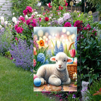 An adorable Easter Lamb surrounded by Easter Eggs and Spring flowers.